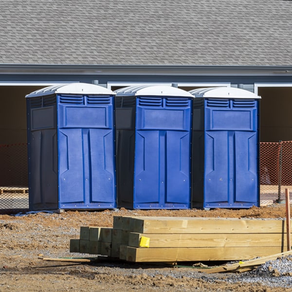 what is the cost difference between standard and deluxe portable toilet rentals in Garfield Wisconsin